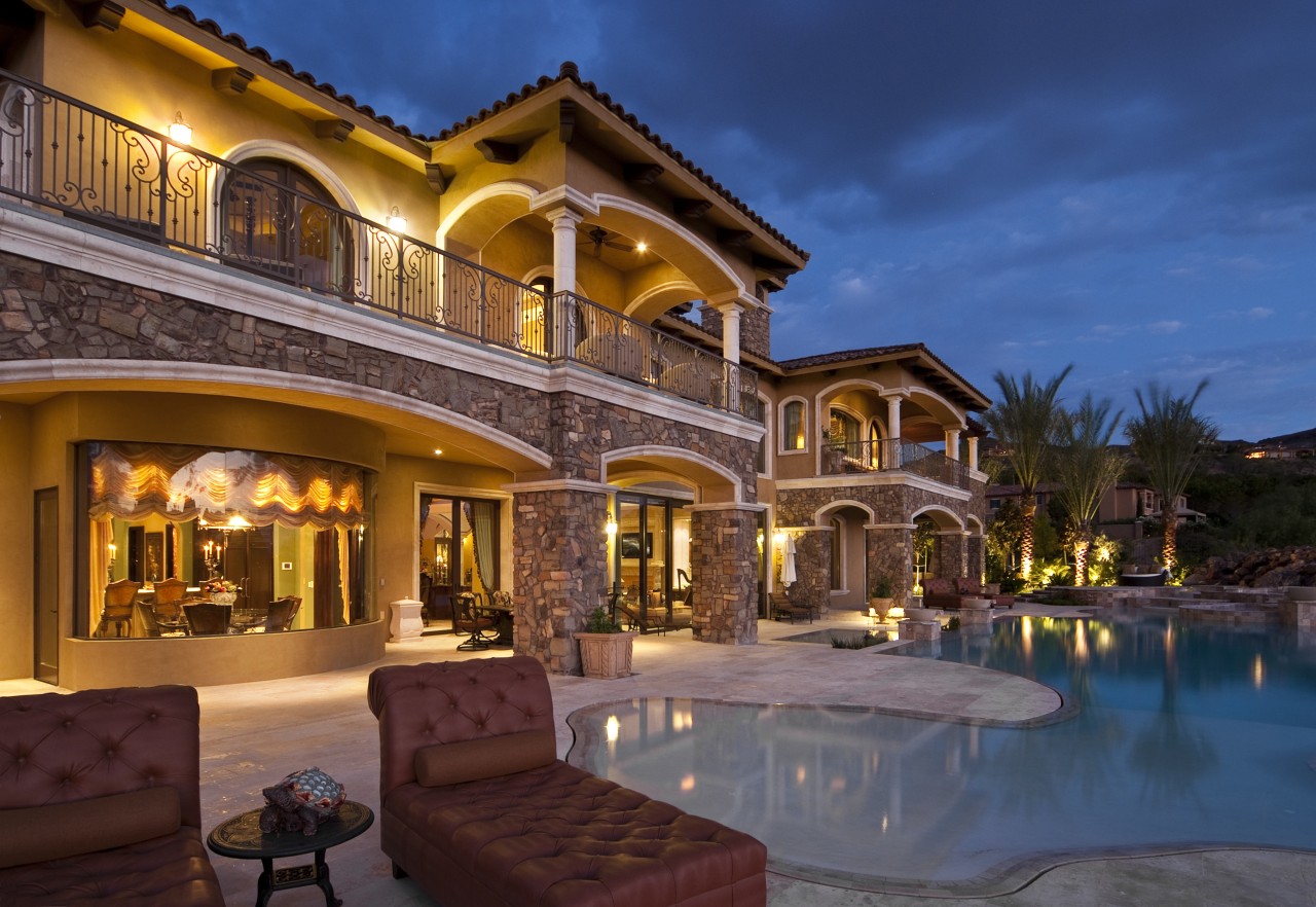 Evening view of poolside living area estate, evening, hacienda, home, hotel, house, landscape lighting, lighting, mansion, property, real estate, resort, resort town, swimming pool, villa, blue
