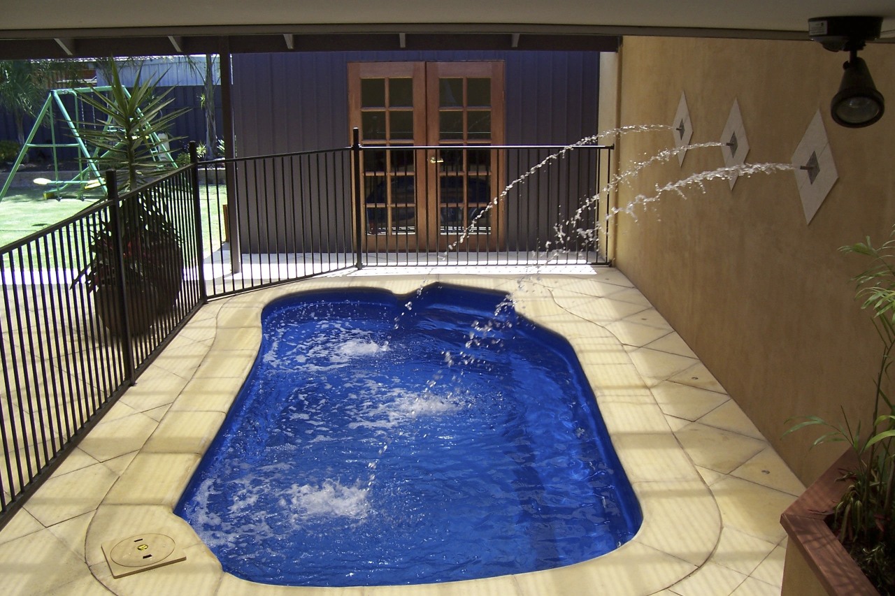 View of a spa pool with jets estate, leisure, property, real estate, swimming pool, water, water feature, brown