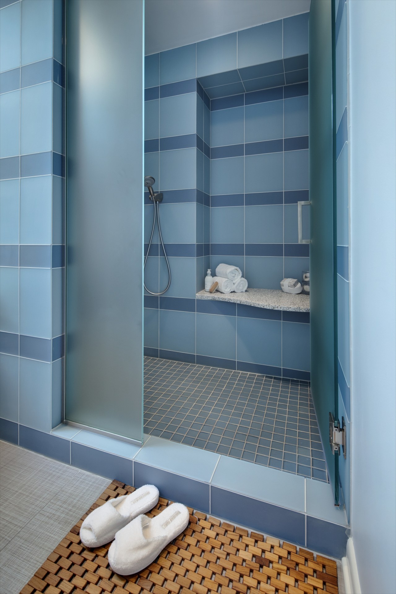 View of shower enclosure with blue wall tiling bathroom, plumbing fixture, room, teal