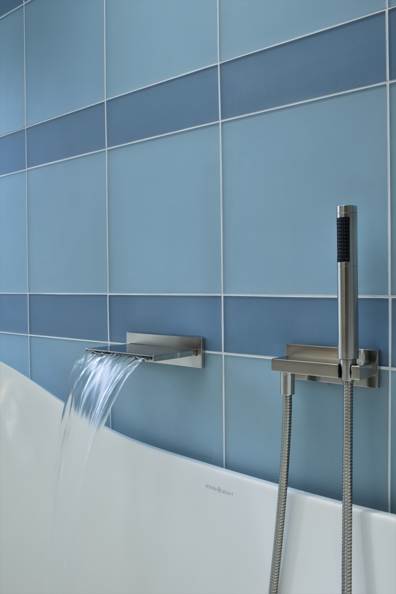 View of shower enclosure with blue wall tiling angle, azure, bathroom, floor, glass, line, plumbing fixture, product design, tap, tile, wall, teal, gray