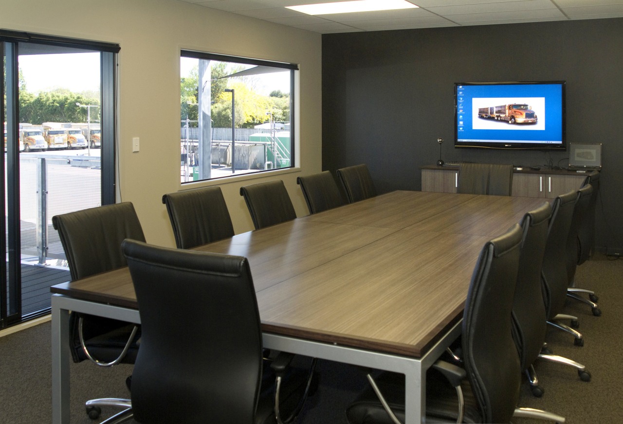 Interior view of the main conference room which conference hall, office, table, black