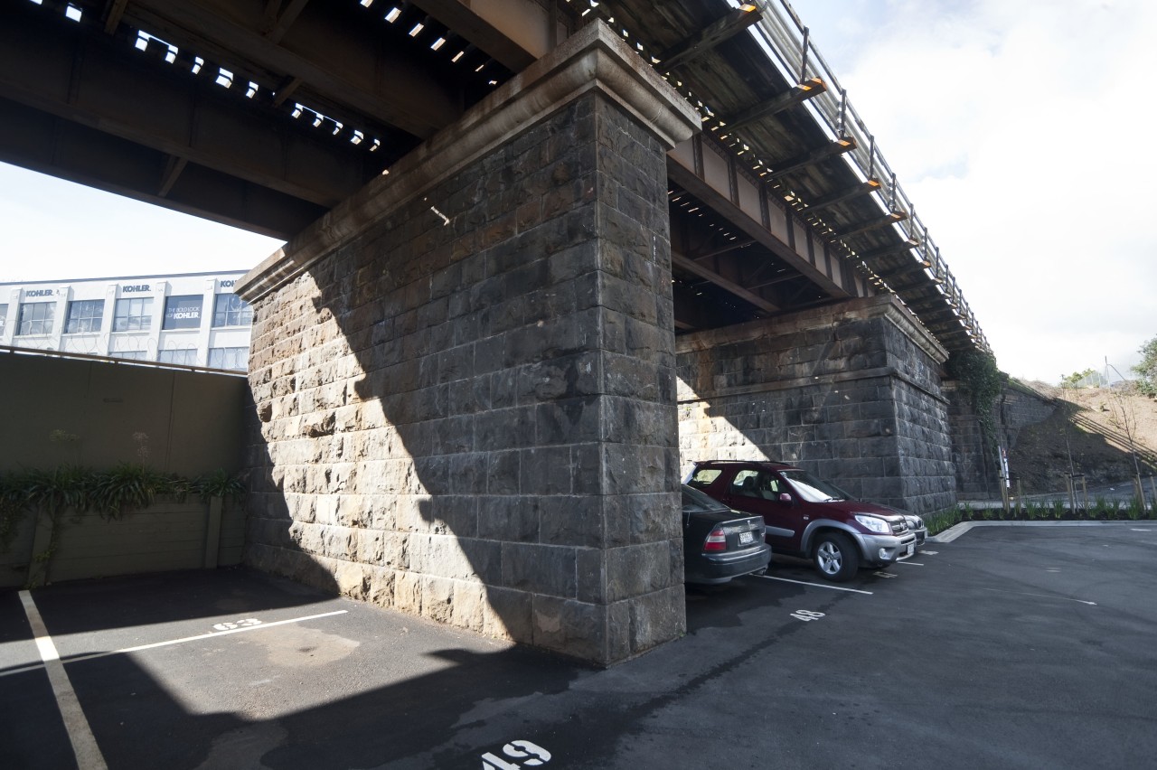 Exterior view of carpark area architecture, asphalt, building, car, infrastructure, luxury vehicle, motor vehicle, road, structure, vehicle, black