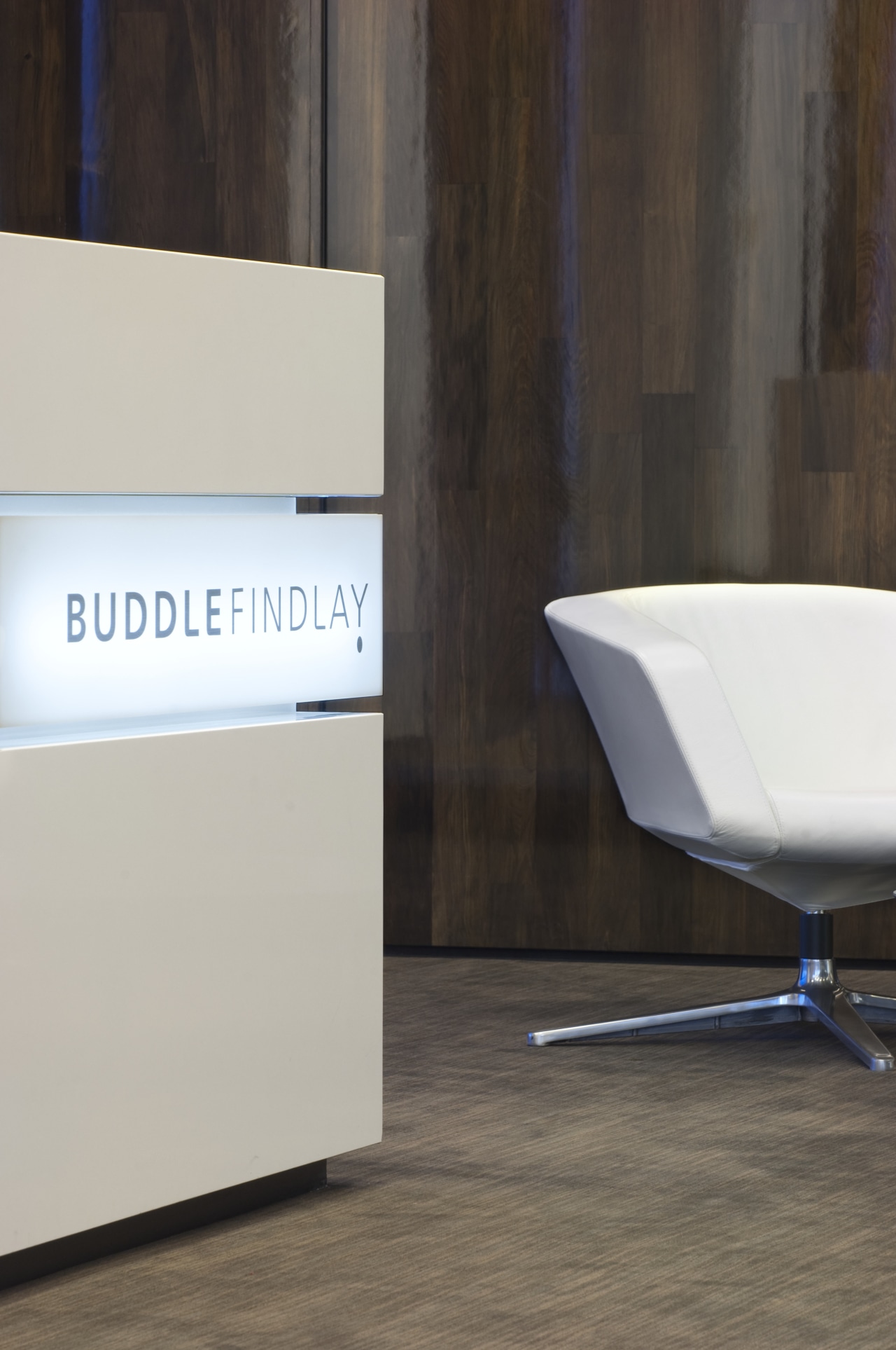 Close-up of the lighting within this office building chair, floor, flooring, furniture, product, product design, table, black, gray