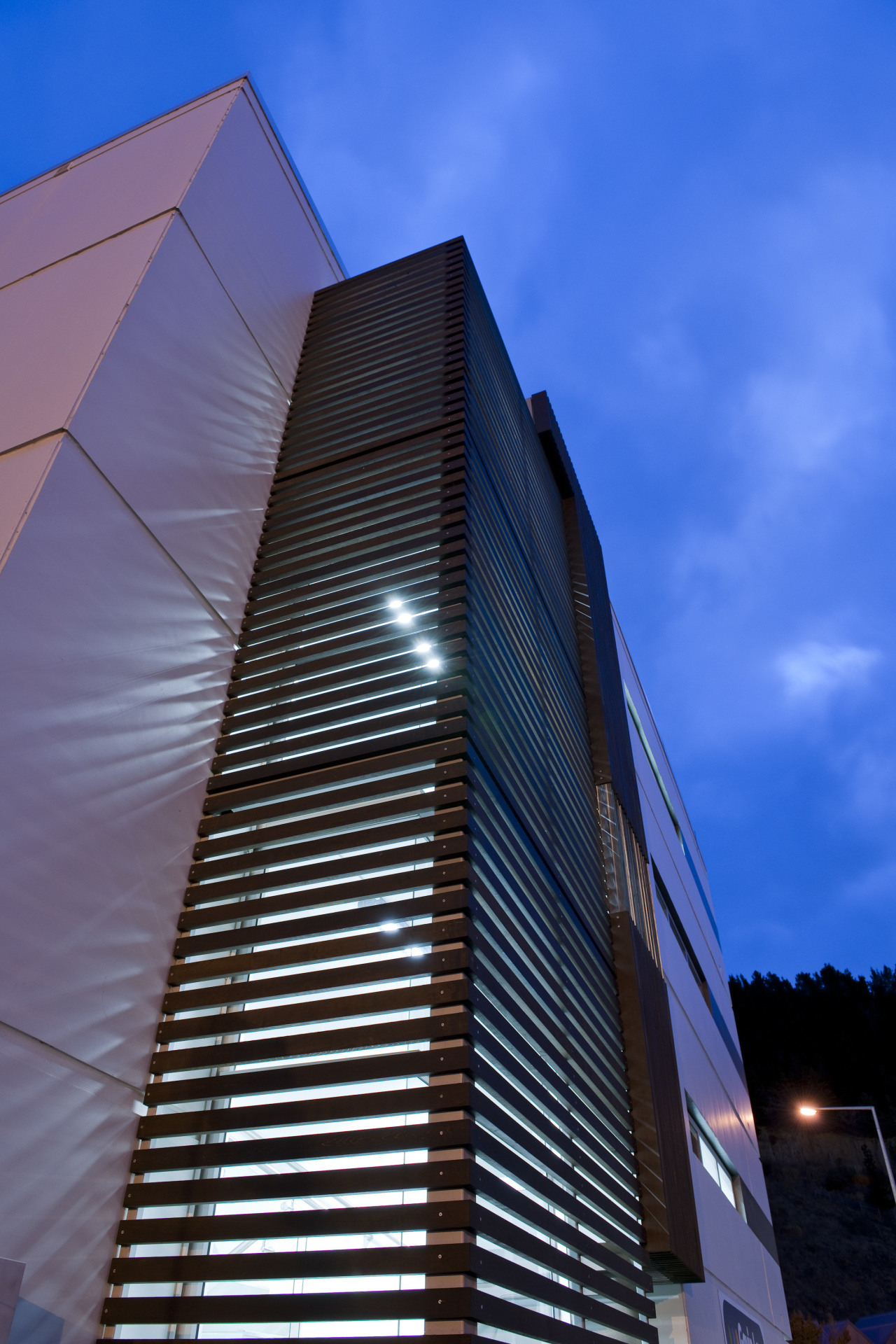 View of a logistics centre designed by Cymon architecture, building, city, commercial building, condominium, corporate headquarters, daytime, facade, headquarters, landmark, line, metropolis, metropolitan area, sky, skyscraper, tower, tower block, urban area, blue