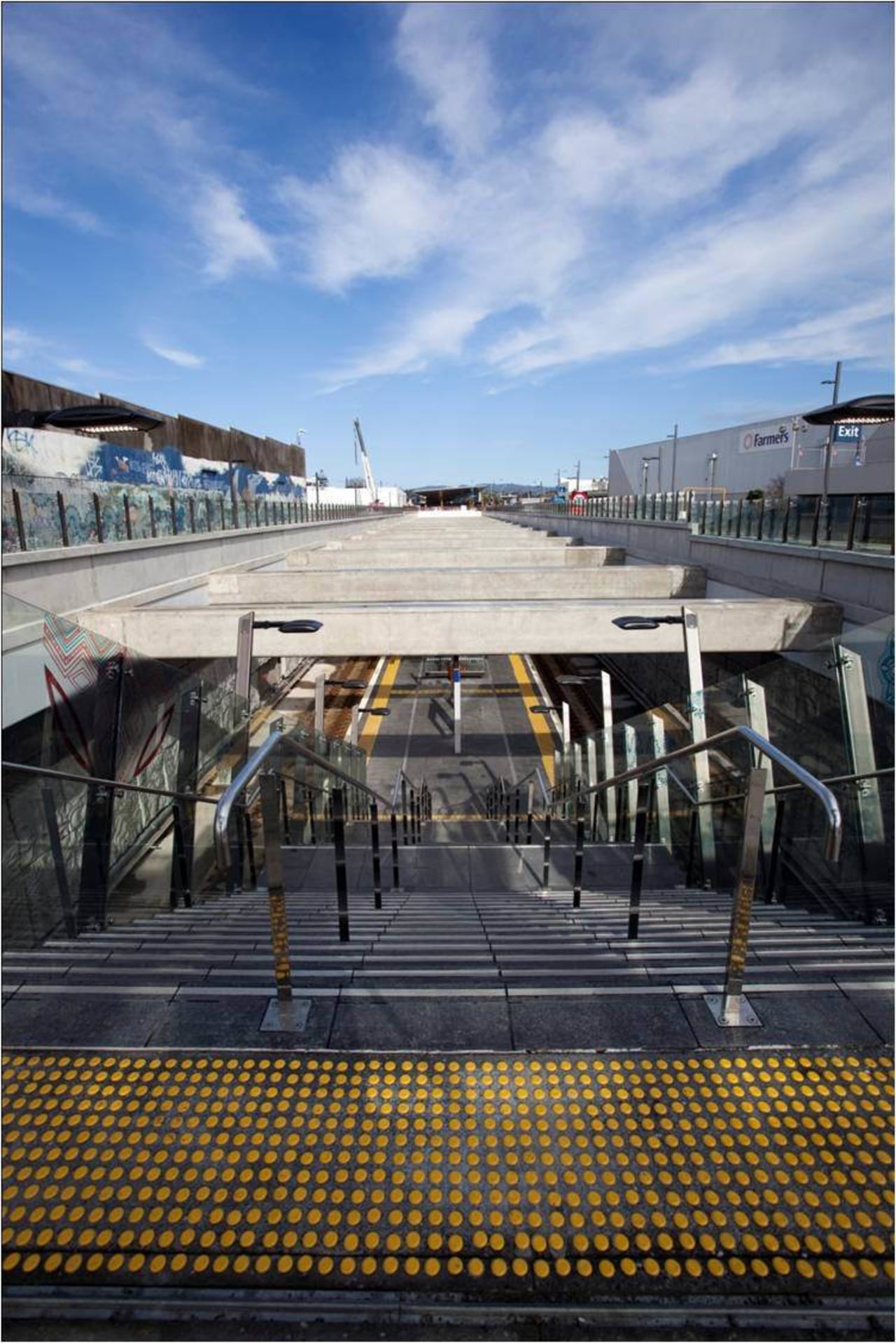 View of stairway with stainless steel handrails at building, cloud, ferry, reflection, sky, vehicle, water, black, teal