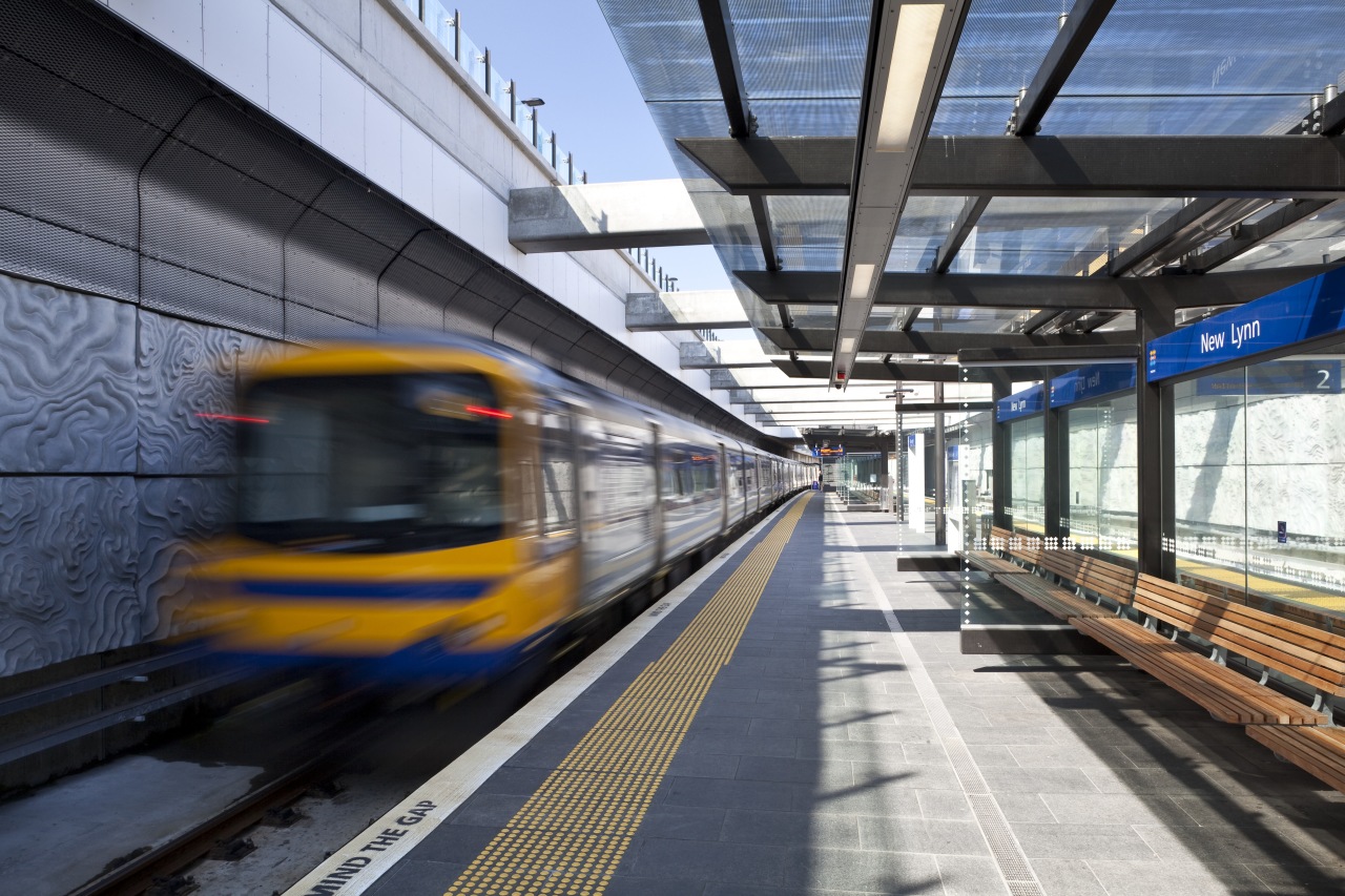 View of the upgraded New Market train station. high speed rail, metro station, metropolis, metropolitan area, mode of transport, passenger, public transport, rail transport, railroad car, rapid transit, residential area, rolling stock, track, train, train station, transport, urban area, black