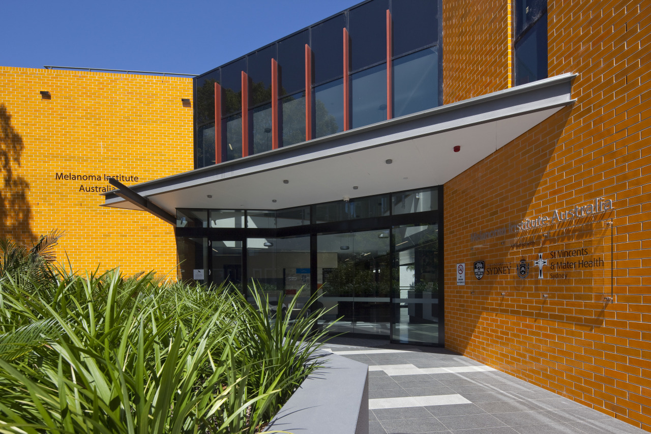 Exterior view of the Poche Centre which was architecture, building, facade, home, house, real estate, residential area, brown