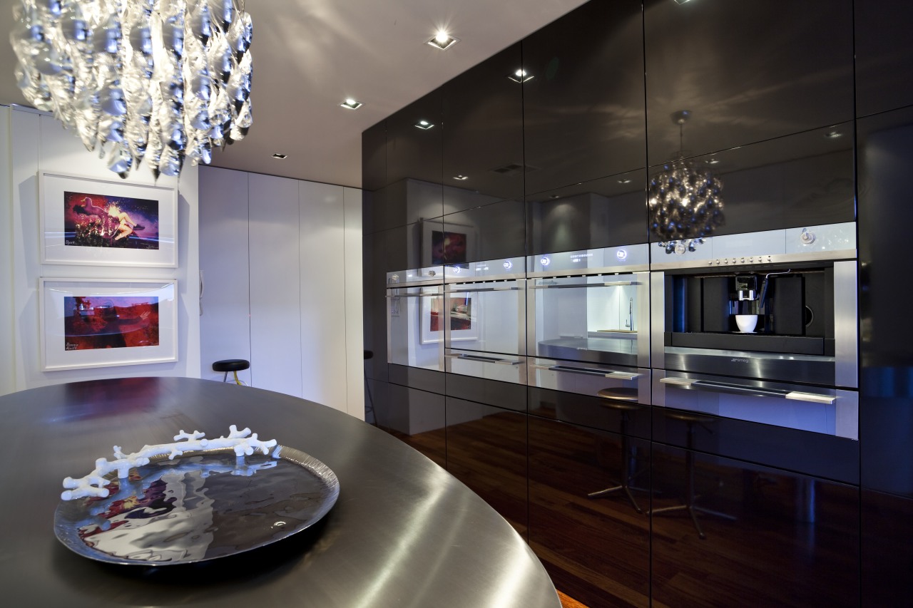 View of a kitchen which features an oval-shaped countertop, interior design, kitchen, room, black, gray