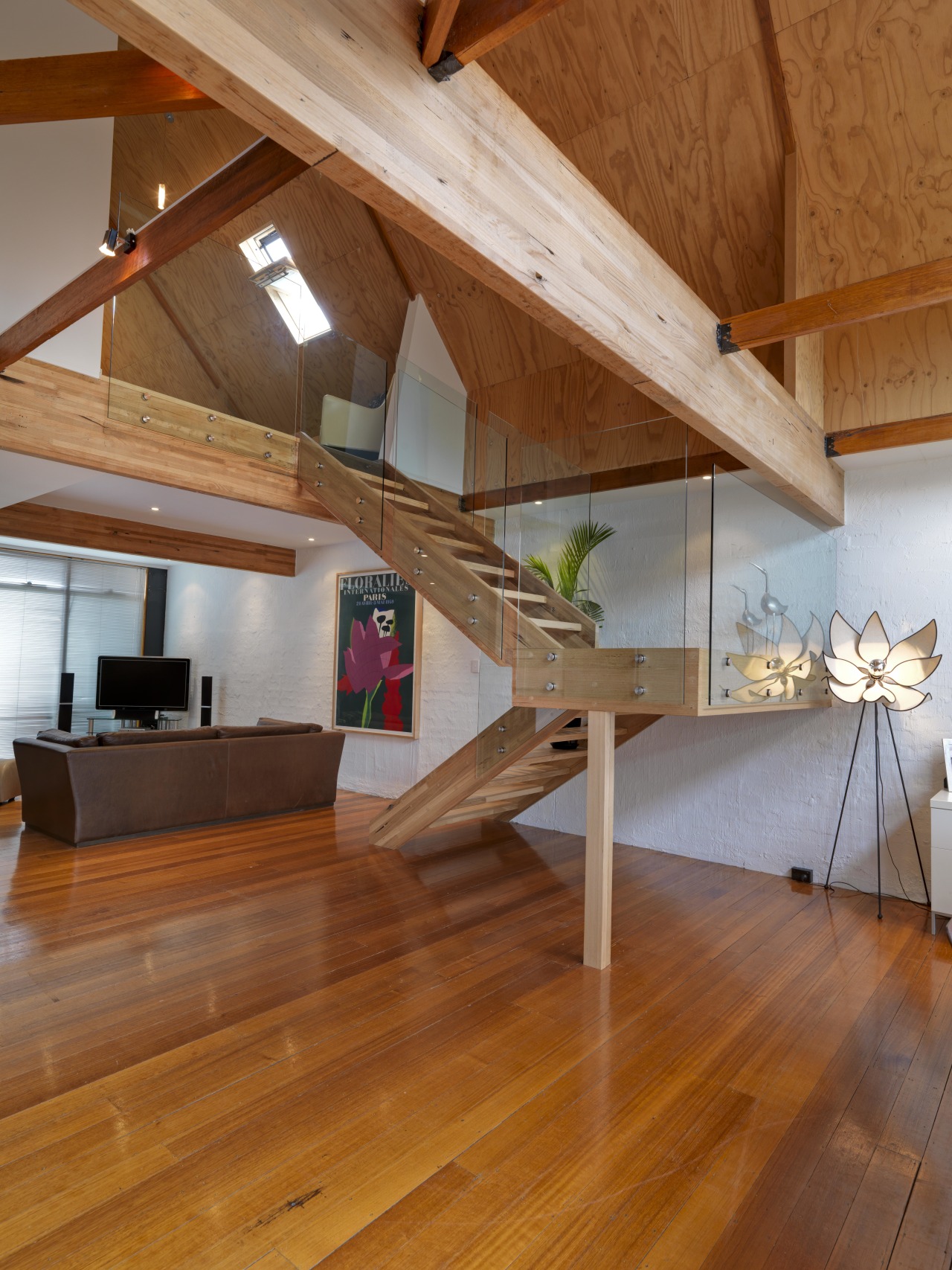 View of bathroom suite with angled openings architecture, attic, beam, ceiling, daylighting, floor, flooring, furniture, hardwood, home, house, interior design, laminate flooring, living room, loft, plywood, stairs, table, wood, wood flooring, brown