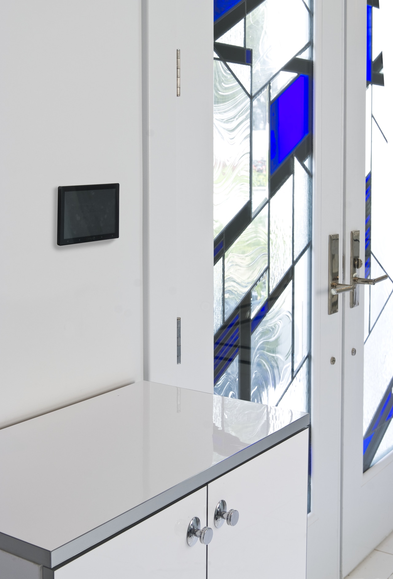 View of the Tran Residence which features home glass, product design, window, white