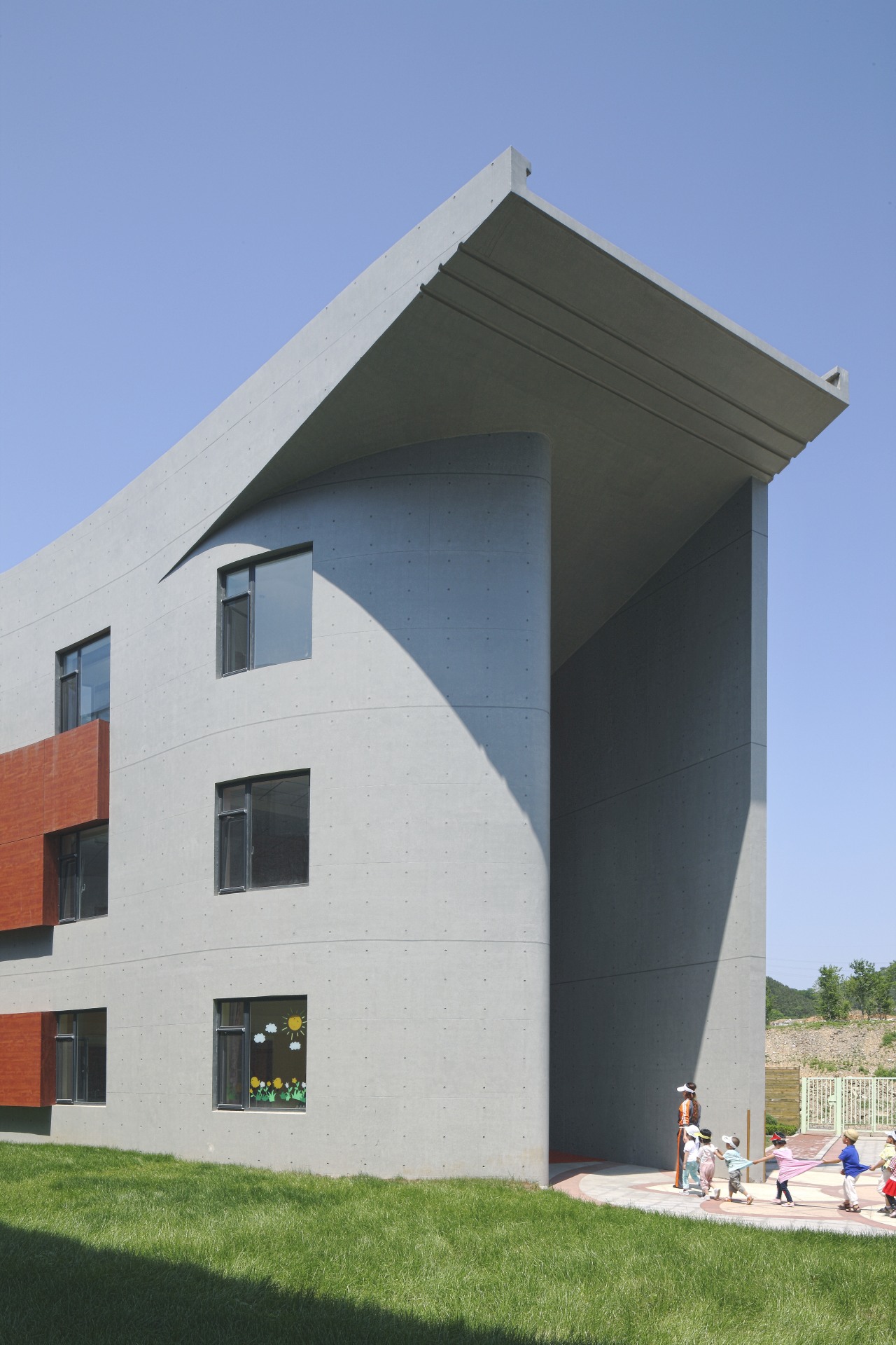 View of Dalian Preschool, with curvilinear forms and architecture, building, elevation, facade, house, sky, teal, gray