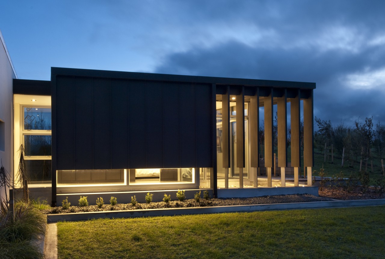 View of contemporary bach with terrace, sheltered courtyard architecture, corporate headquarters, facade, home, house, real estate, shed, sky, black, teal