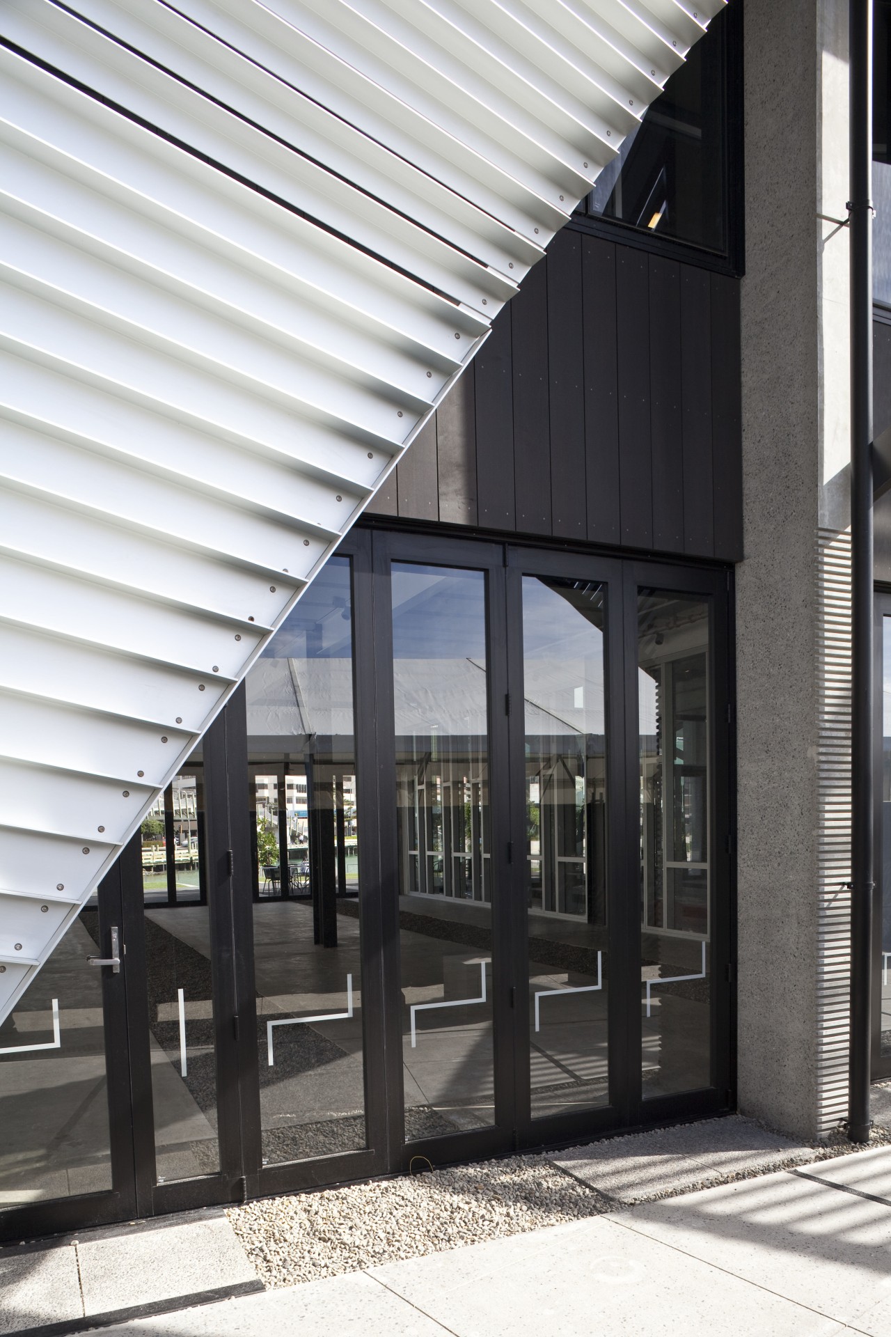 View of the aluminium joinery and window winding architecture, building, daylighting, facade, glass, structure, window, white, black