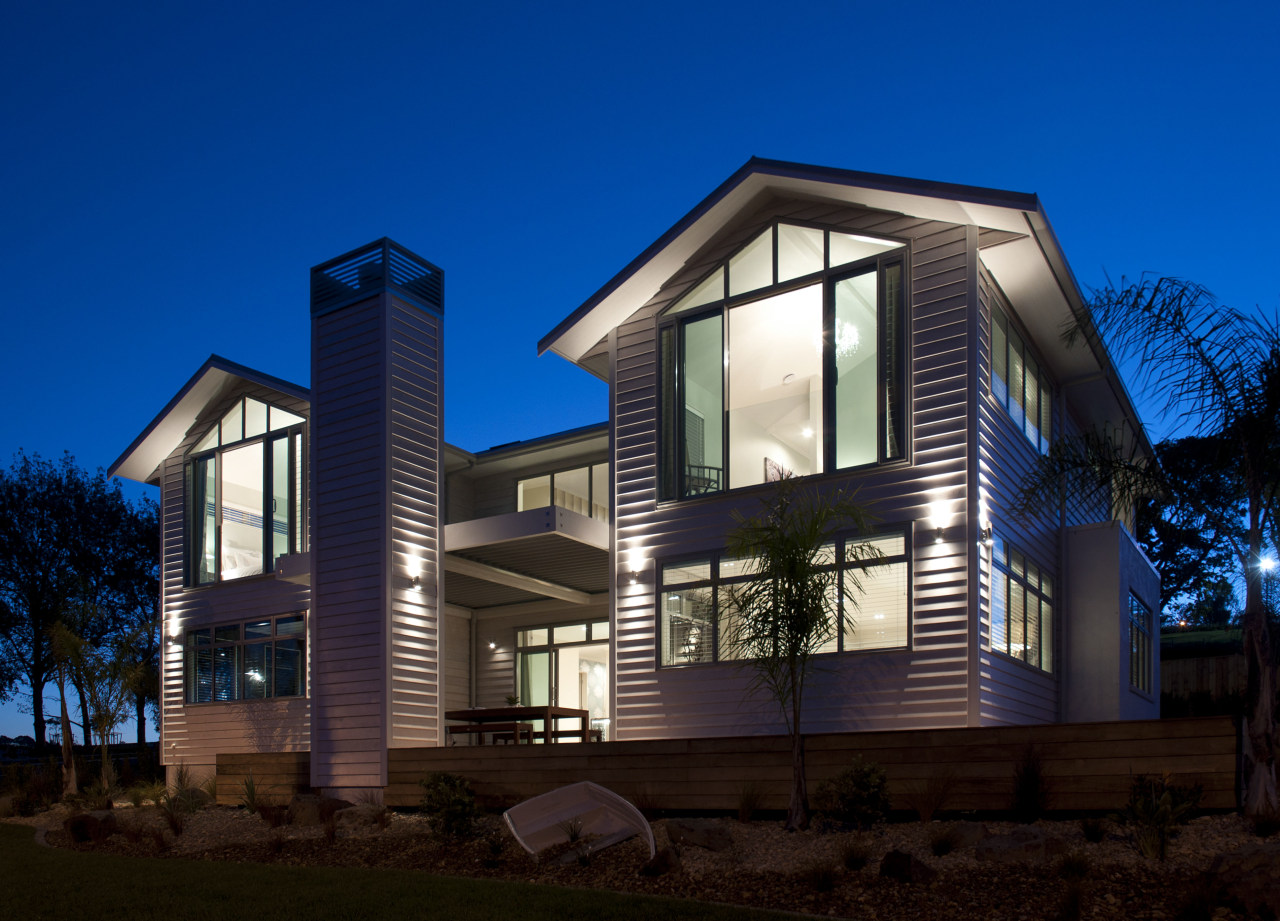 View of the Boathouse, designed to be reminiscent architecture, building, corporate headquarters, cottage, elevation, estate, facade, home, house, lighting, mixed use, property, real estate, residential area, siding, sky, window, blue, black