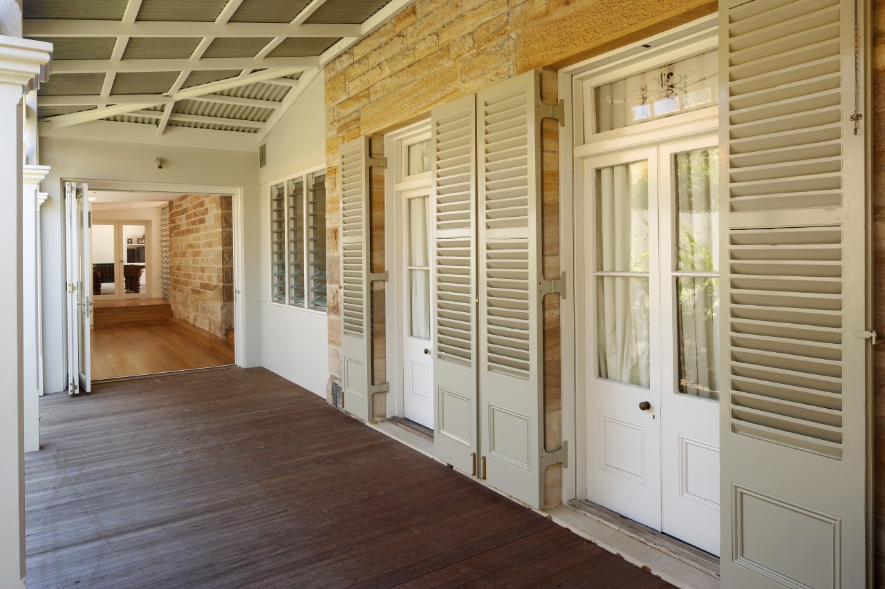 Exterior view of a renovated period home. - door, estate, floor, flooring, hardwood, home, house, interior design, porch, property, real estate, window, wood, wood flooring, gray, brown, orange