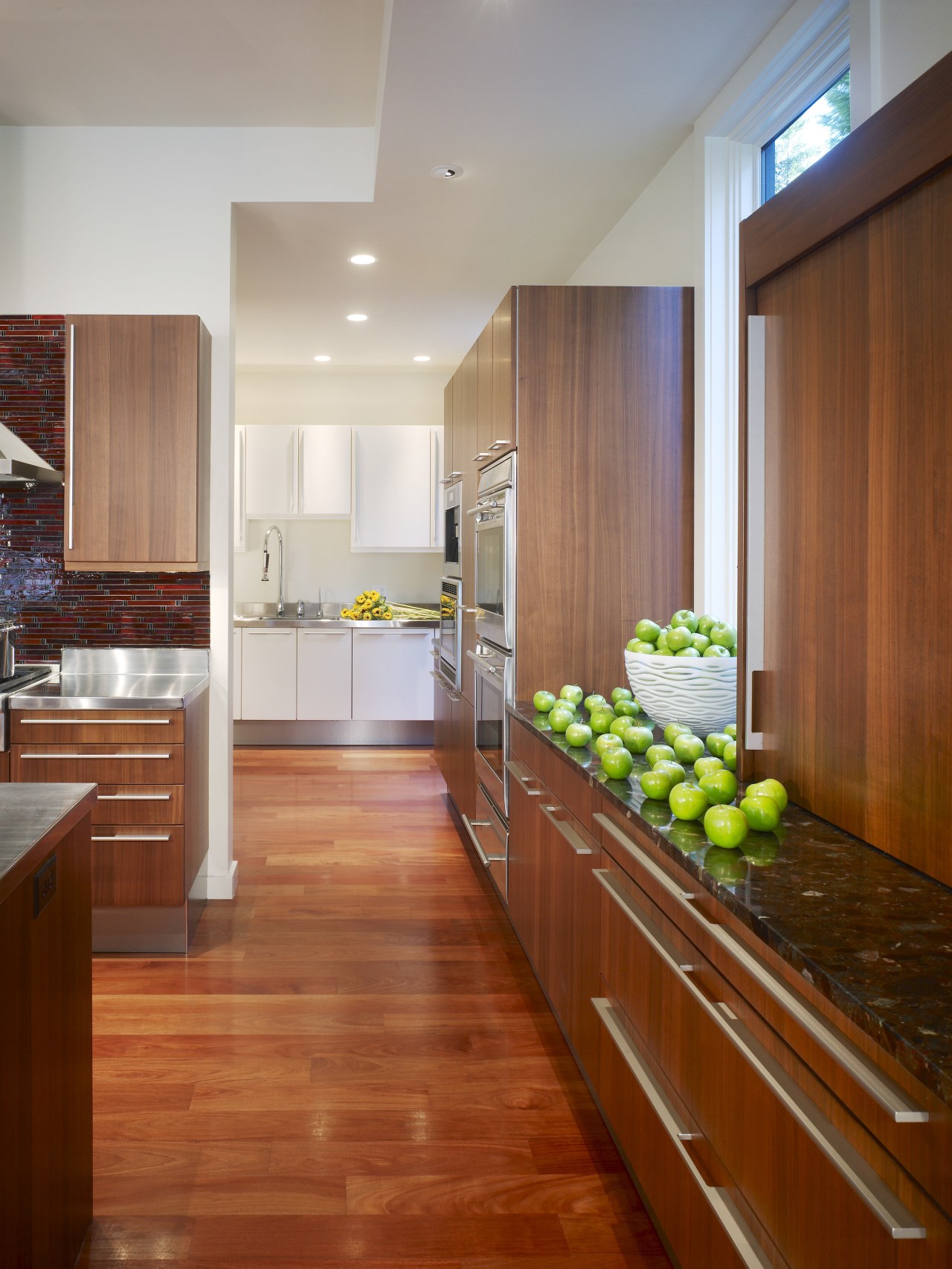 View of a kitchen which combines commerical touches cabinetry, countertop, floor, flooring, hardwood, interior design, kitchen, laminate flooring, real estate, room, wood, wood flooring, brown, gray