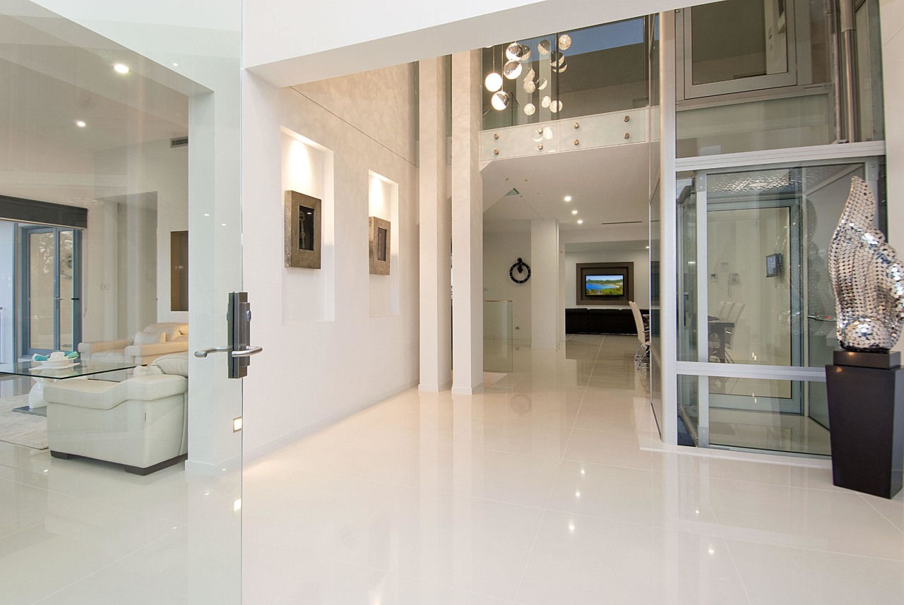 View of home by Balmoral Homes featuring trickling ceiling, floor, flooring, interior design, lobby, real estate, gray