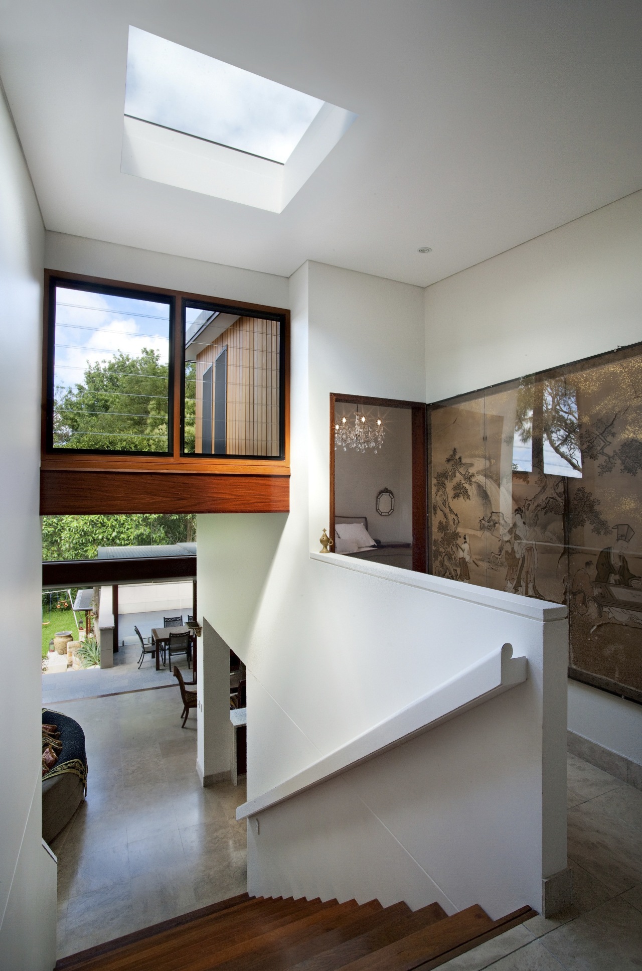 View of contemporary home with light-toned walls and architecture, ceiling, daylighting, floor, home, house, interior design, living room, real estate, table, window, gray