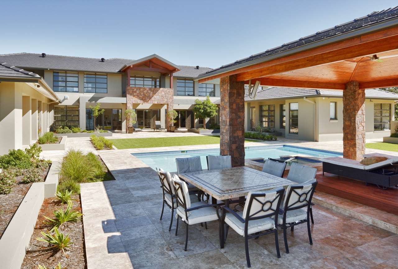 View of contemporary home with outdoor seating area backyard, estate, hacienda, home, house, leisure, patio, property, real estate, resort, swimming pool, villa, gray