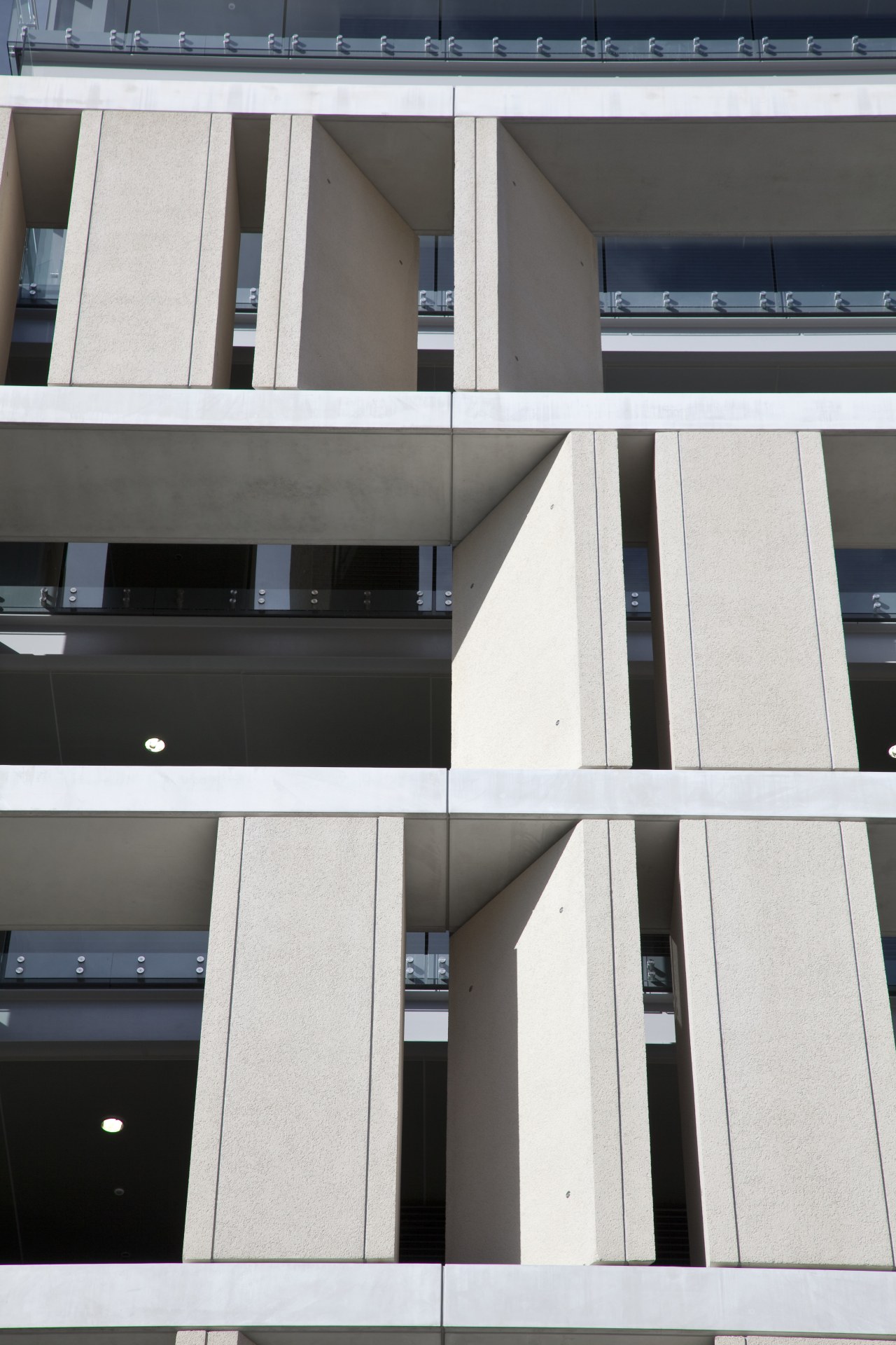 View of cladding by Unicast Cladding Systems. architecture, building, commercial building, condominium, corporate headquarters, facade, glass, structure, window, white