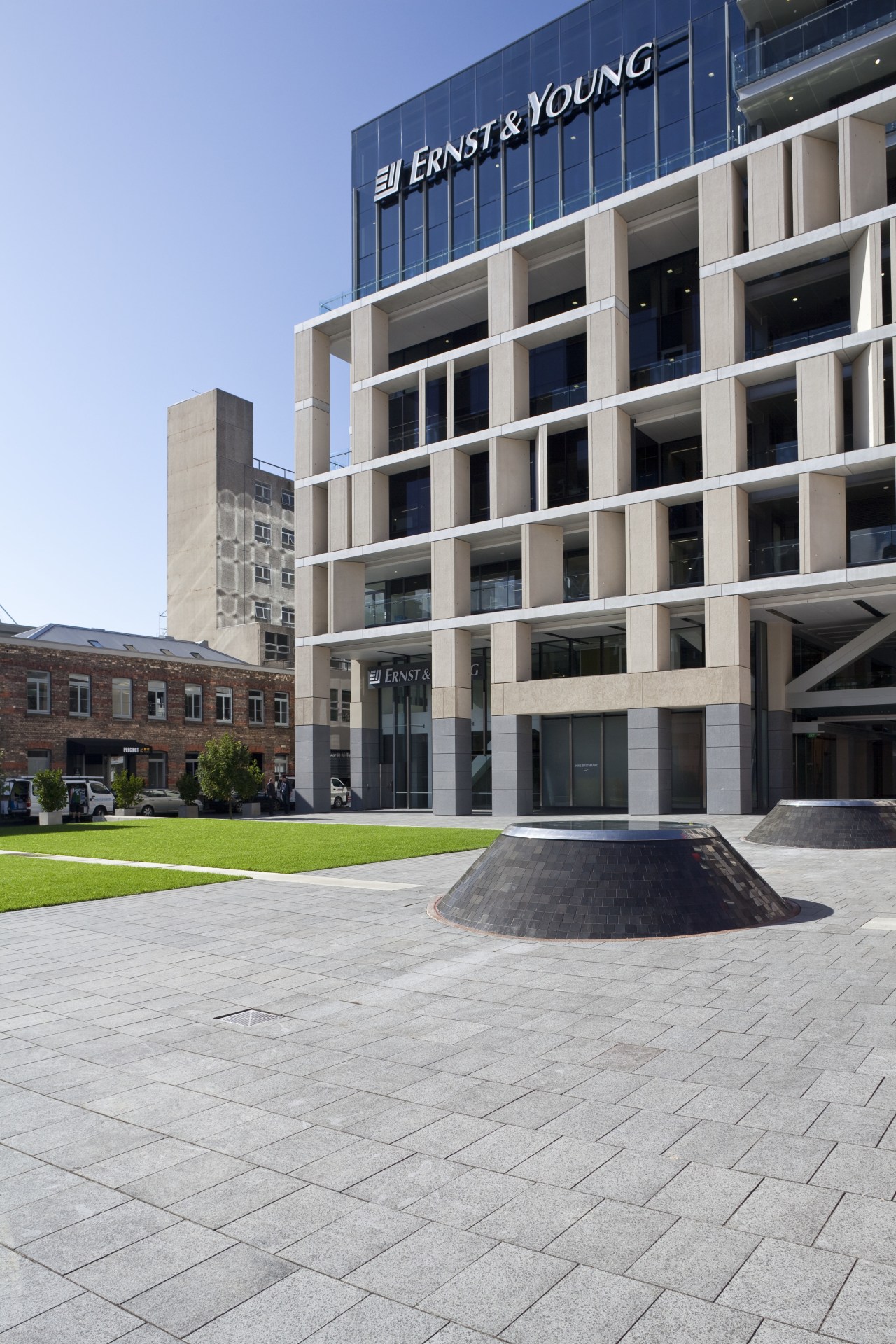 View of the public square at the Britomart apartment, architecture, building, condominium, corporate headquarters, daytime, facade, mixed use, neighbourhood, real estate, residential area, window, gray