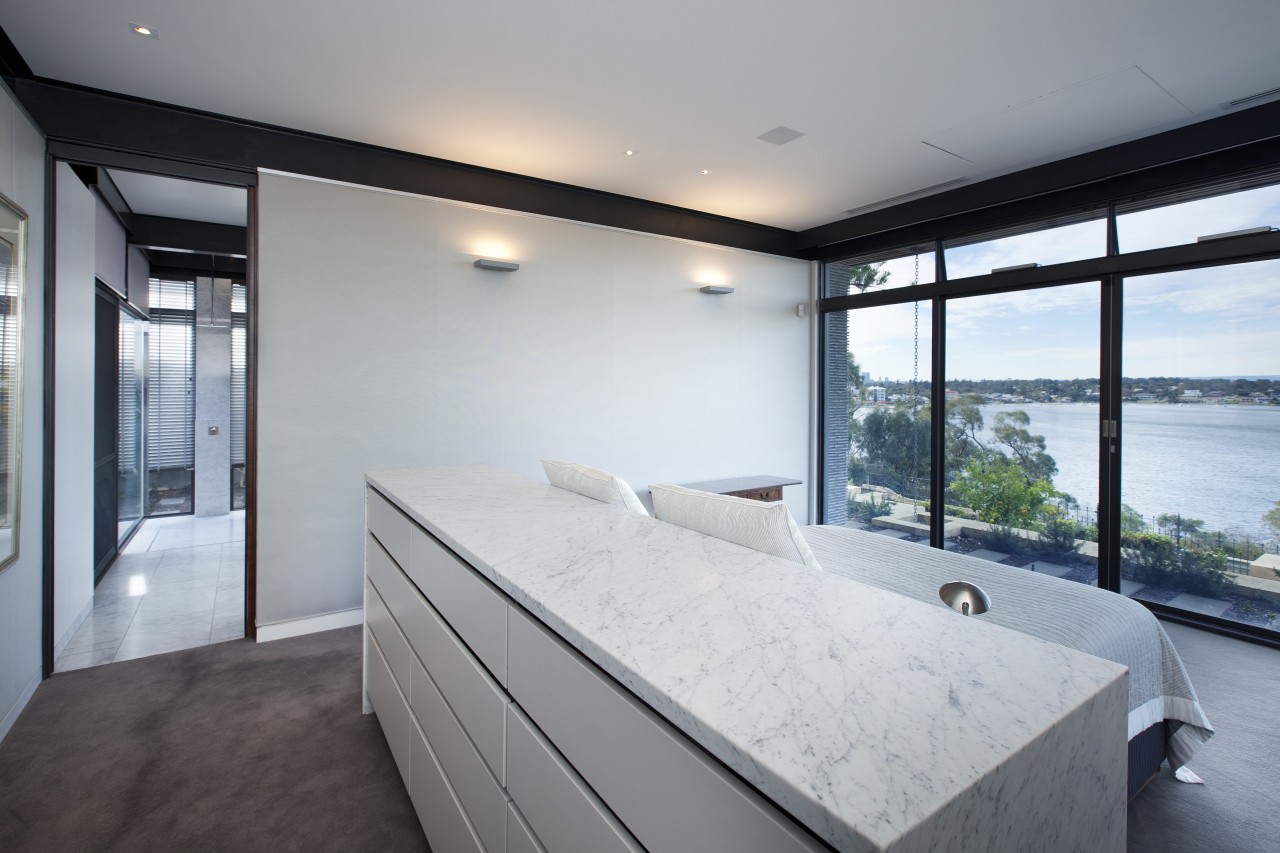 The master bed in this modern master suite apartment, architecture, estate, house, interior design, property, real estate, room, window, gray