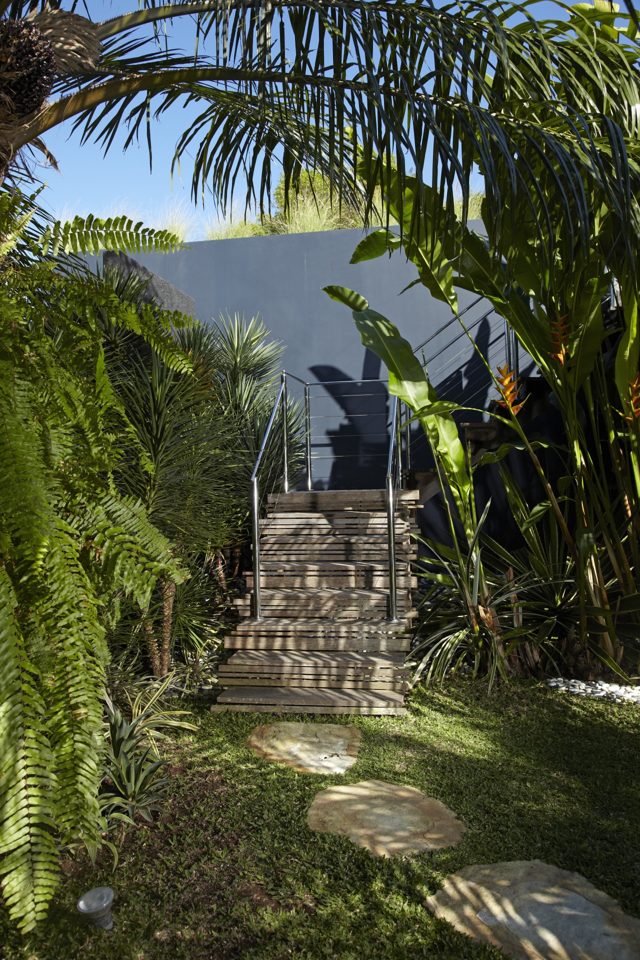 The Bali holiday homes was designed by Alessandro arecales, outdoor structure, palm tree, plant, real estate, tree, tropics, vegetation, water, brown, black