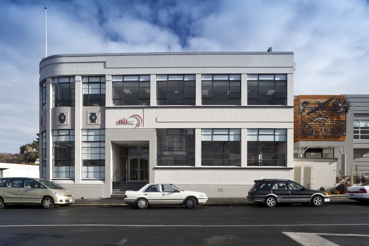 View of the former Woollen Mills factory, now architecture, building, car, commercial building, corporate headquarters, facade, family car, luxury vehicle, mixed use, real estate, vehicle, black