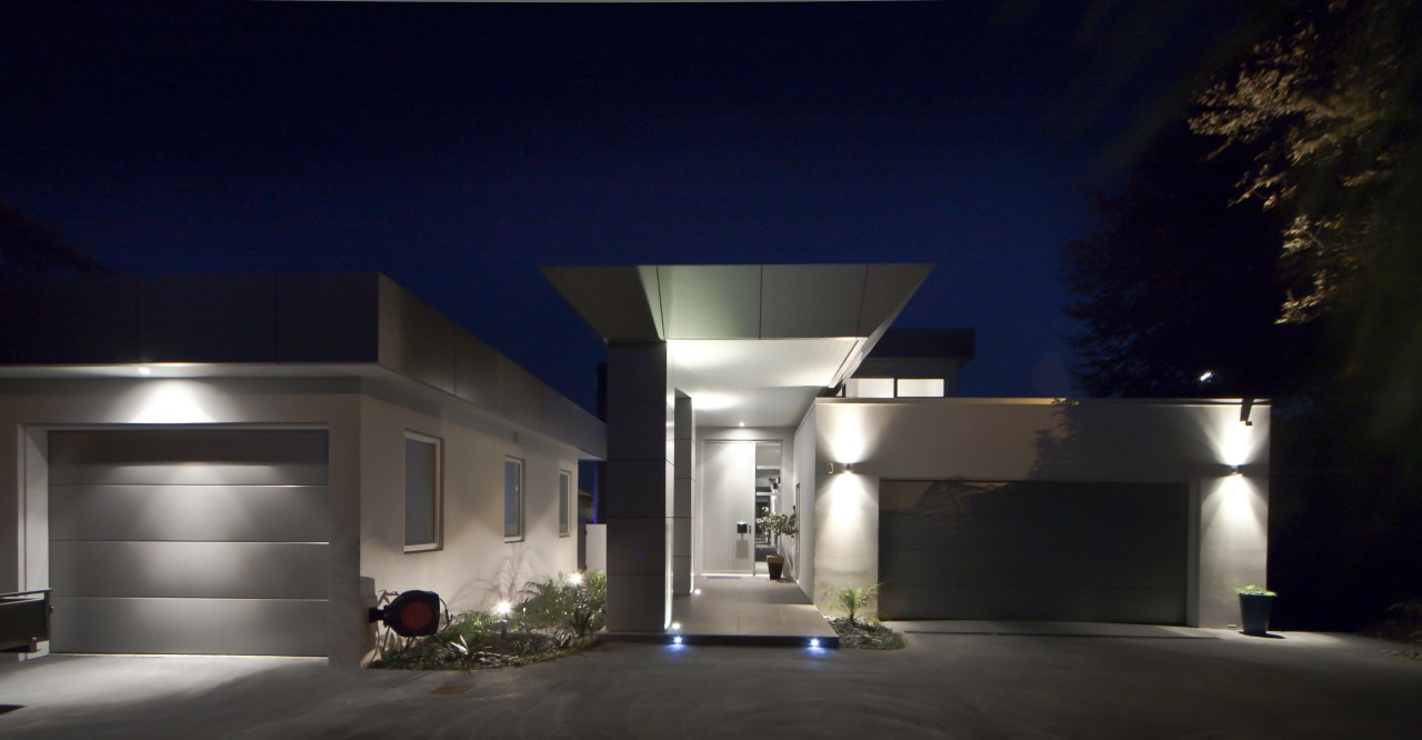 This house was designed and built by Signature architecture, building, estate, facade, home, house, lighting, property, real estate, sky, black, blue