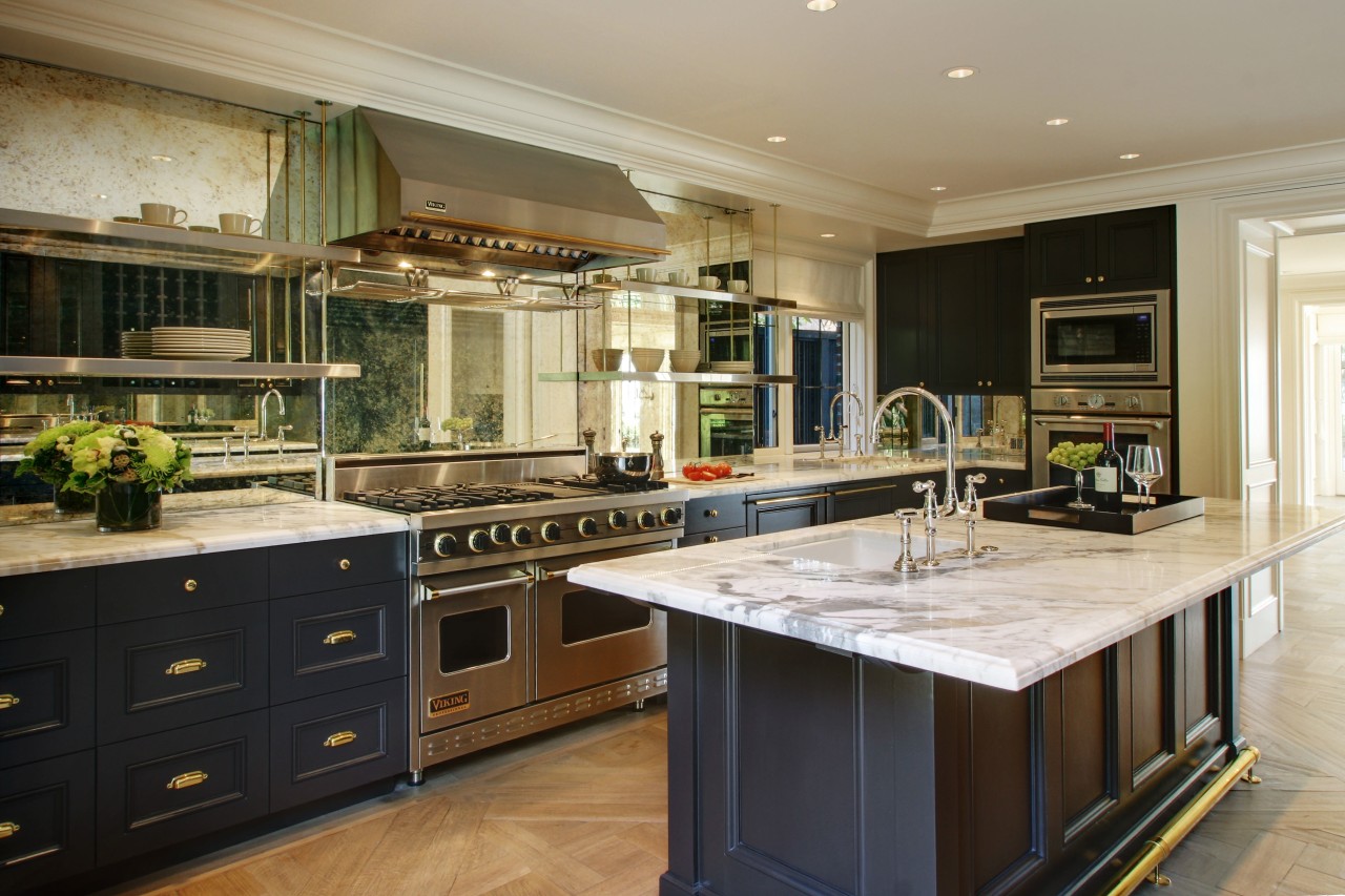 The foyer staircase and walls feature an easily cabinetry, countertop, cuisine classique, interior design, kitchen, room, black, brown, gray