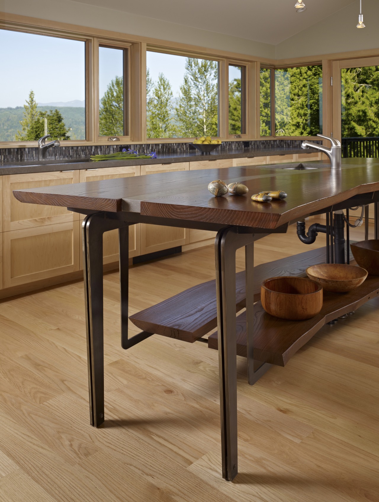 This home and kitchen was designed by Finne coffee table, floor, flooring, furniture, hardwood, table, wood, wood flooring, wood stain, brown