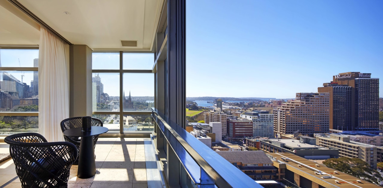 View of covered deck at The Residence, Hyde apartment, balcony, building, city, condominium, downtown, penthouse apartment, property, real estate, sky