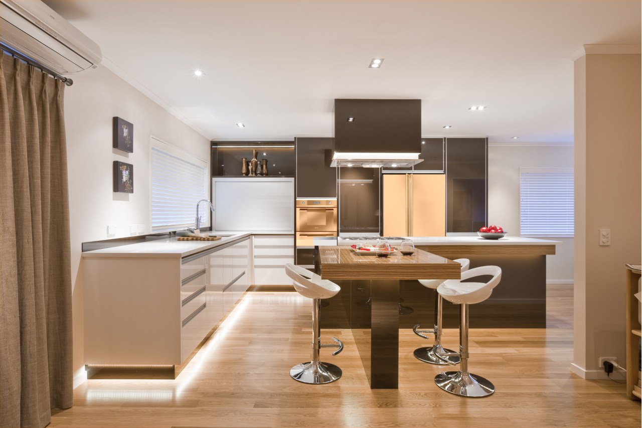 View of kitchen. Warm chocolare toens contrast with cabinetry, countertop, cuisine classique, floor, furniture, interior design, kitchen, office, real estate, room, gray, orange