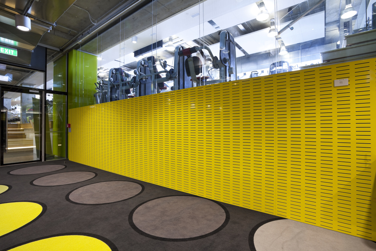 This Les Mills gym in the Britomart precinct architecture, interior design, wall, yellow, orange