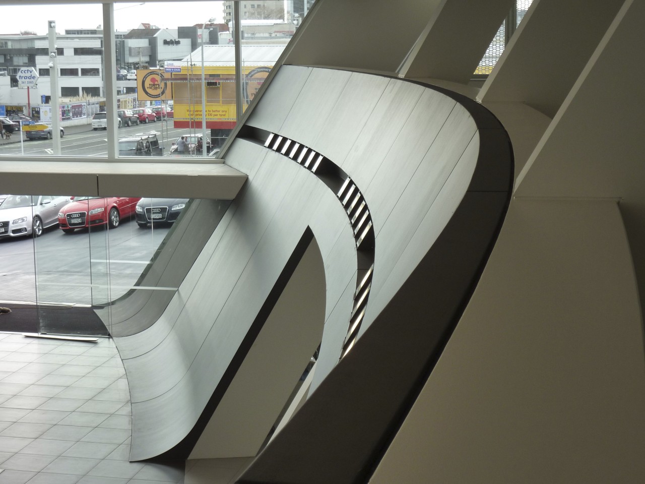 Here is a view of the curved wall architecture, automotive design, automotive exterior, design, product design, gray, black