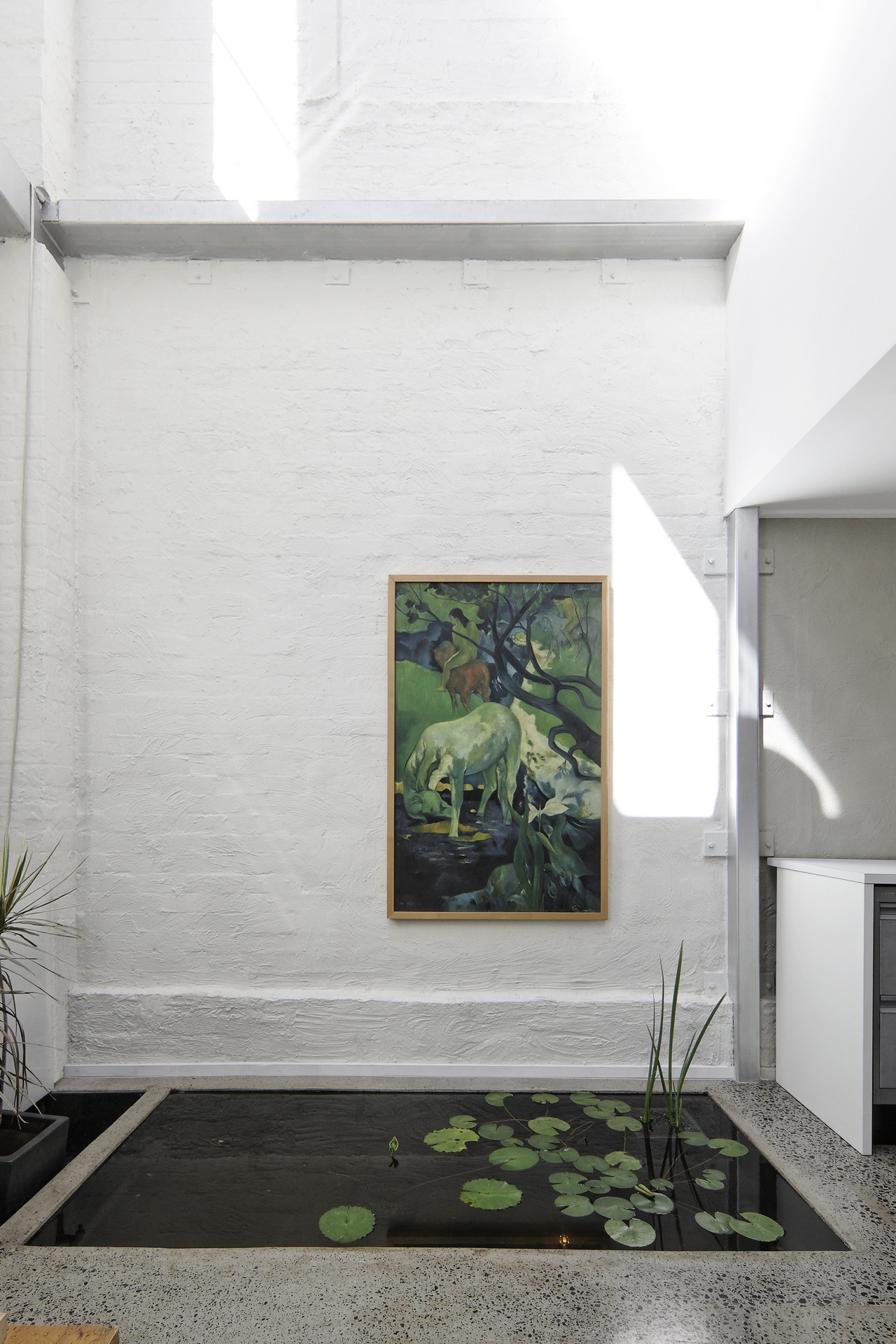 View of pond with print on wall. architecture, floor, house, interior design, wall, white