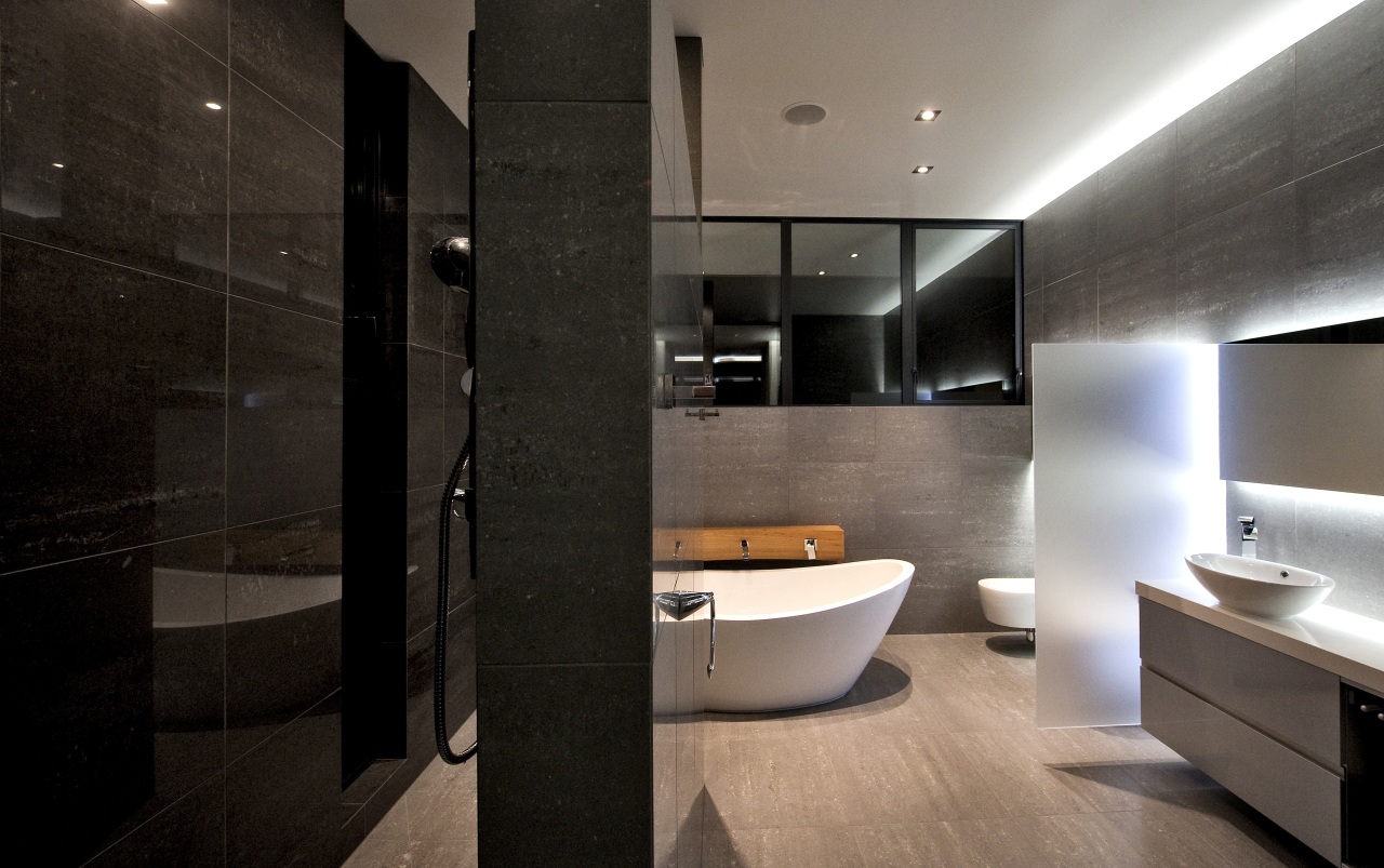 This home was designed by Gerrad Hall, the architecture, bathroom, floor, interior design, product design, room, sink, black