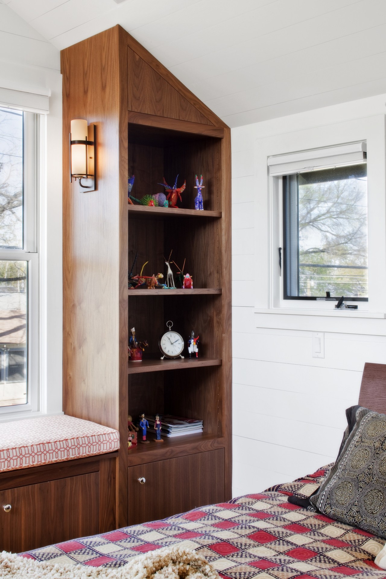 View of wooden shelving in bedroom with white bookcase, cabinetry, furniture, home, interior design, living room, room, shelf, shelving, white, red