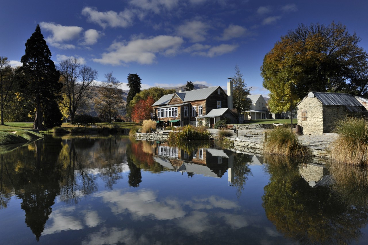 Here is a view of Millbrook Country Club bank, body of water, canal, cloud, cottage, estate, evening, home, house, lake, landscape, leaf, nature, plant, pond, real estate, reflection, residential area, river, sky, tree, village, water, watercourse, waterway, blue, black