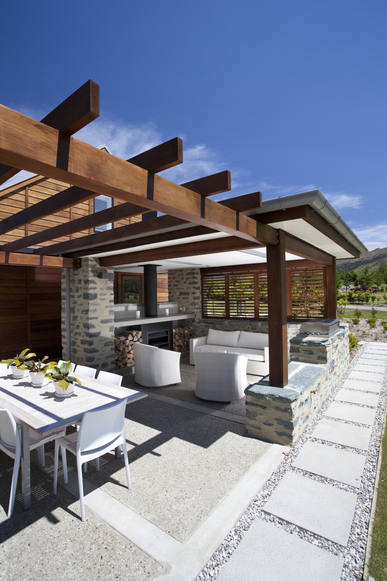This home was designed by Mason & Wales backyard, estate, home, house, outdoor structure, patio, property, real estate, residential area, roof, white, blue