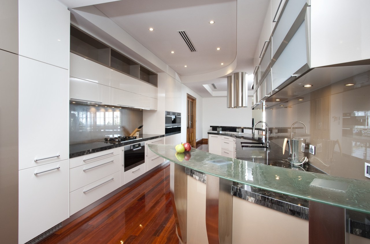 View of contempoary kitchen with wooden flooring, white cabinetry, countertop, cuisine classique, interior design, kitchen, property, real estate, room, gray