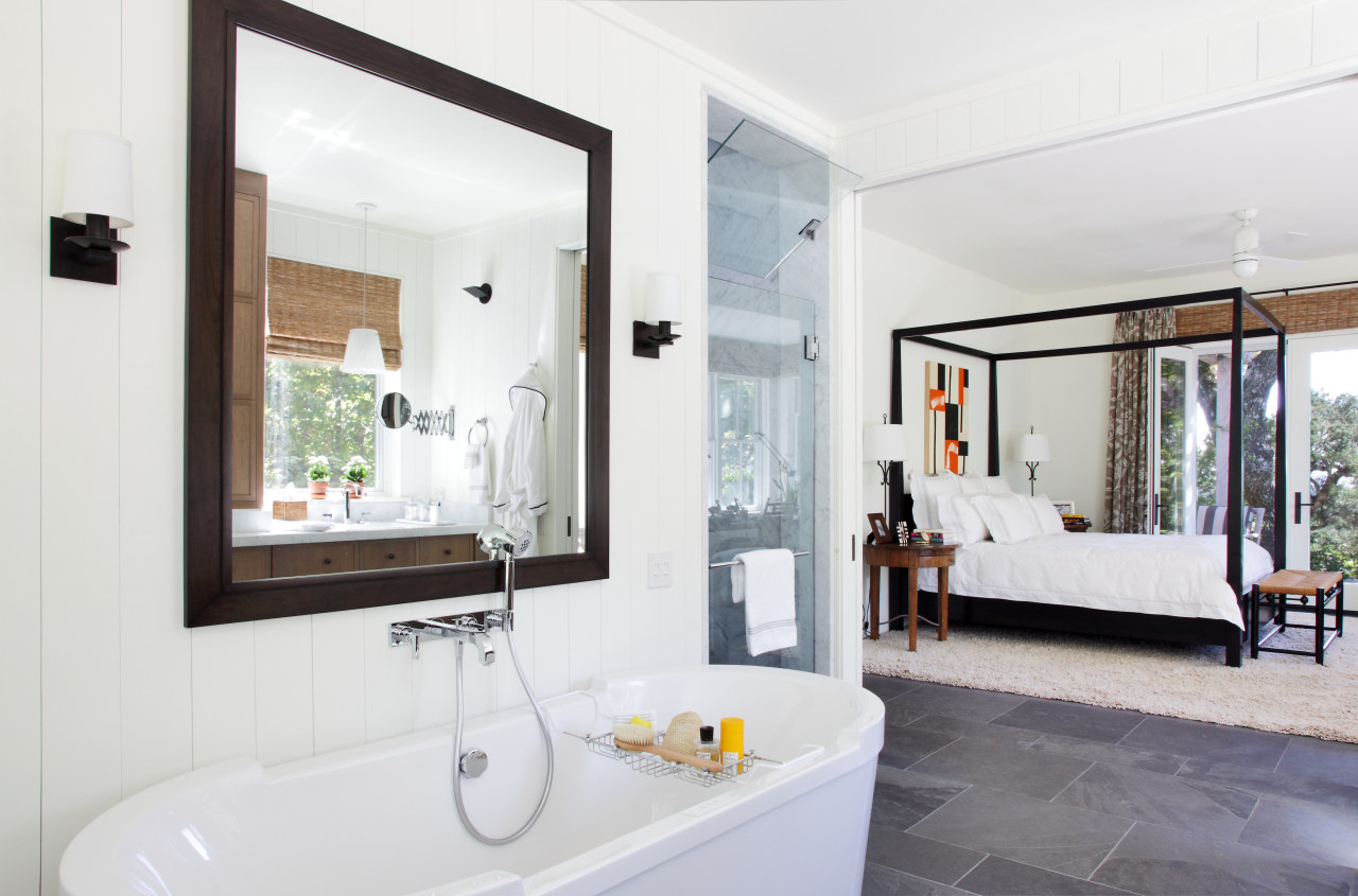 Bathroom with grey tiled flooring and white tub. bathroom, home, interior design, property, real estate, room, window, white