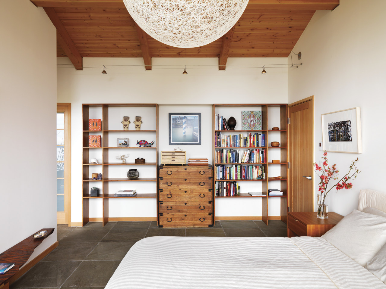 View of bedroom with wooden shelving. ceiling, floor, flooring, furniture, home, interior design, room, shelving, wall, wood, white