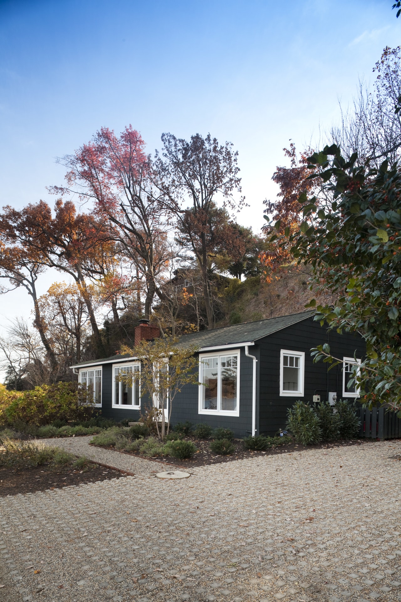 Driveway and path leading up to dark grey architecture, autumn, cottage, estate, facade, farmhouse, home, house, leaf, neighbourhood, plant, property, real estate, residential area, sky, suburb, tree, gray