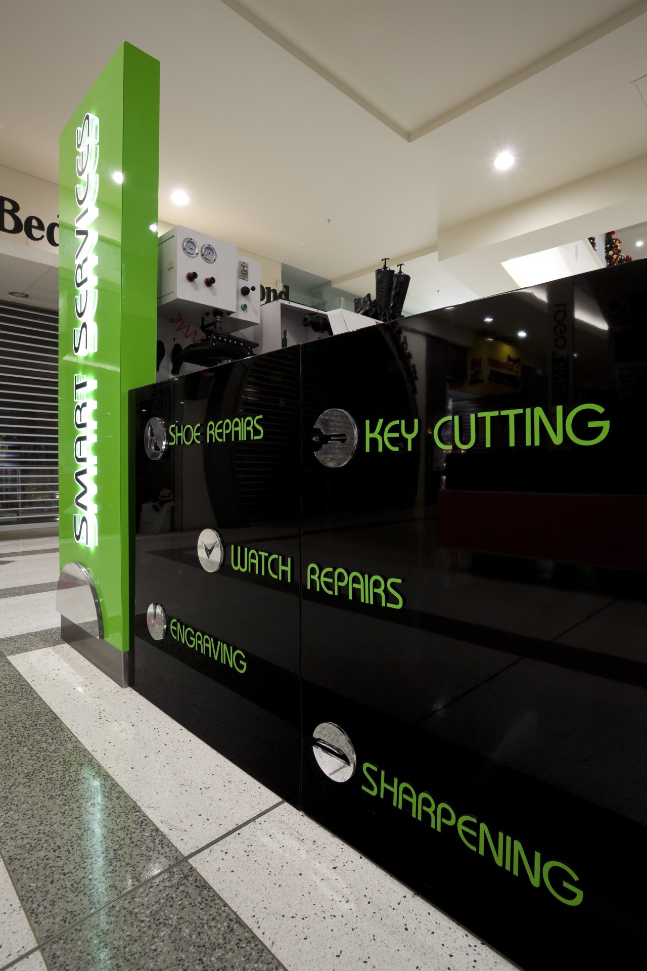 View of signage at Smart Savers retail shop. advertising, design, green, technology, black, gray