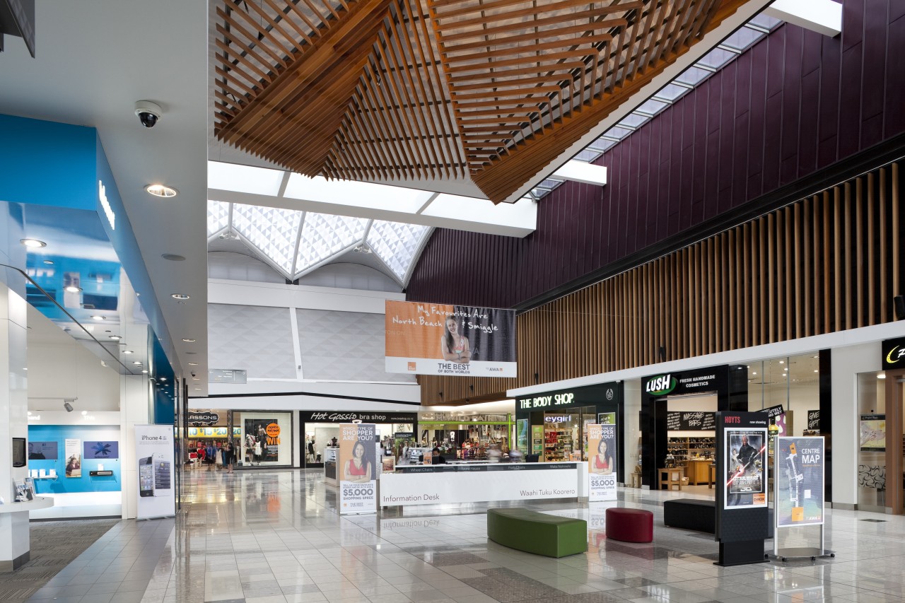 View of light toned interior of mall. ceiling, interior design, lobby, retail, shopping mall, gray