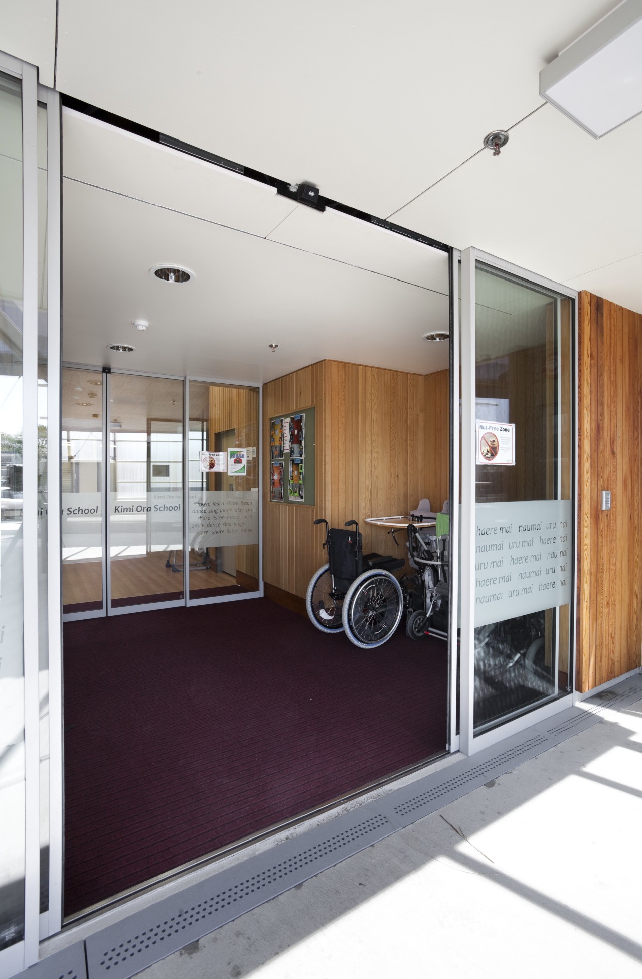 View of entry to school. door, floor, white
