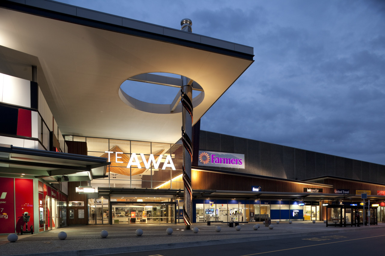 Exterior view of mall at dusk. building, city, sky, black