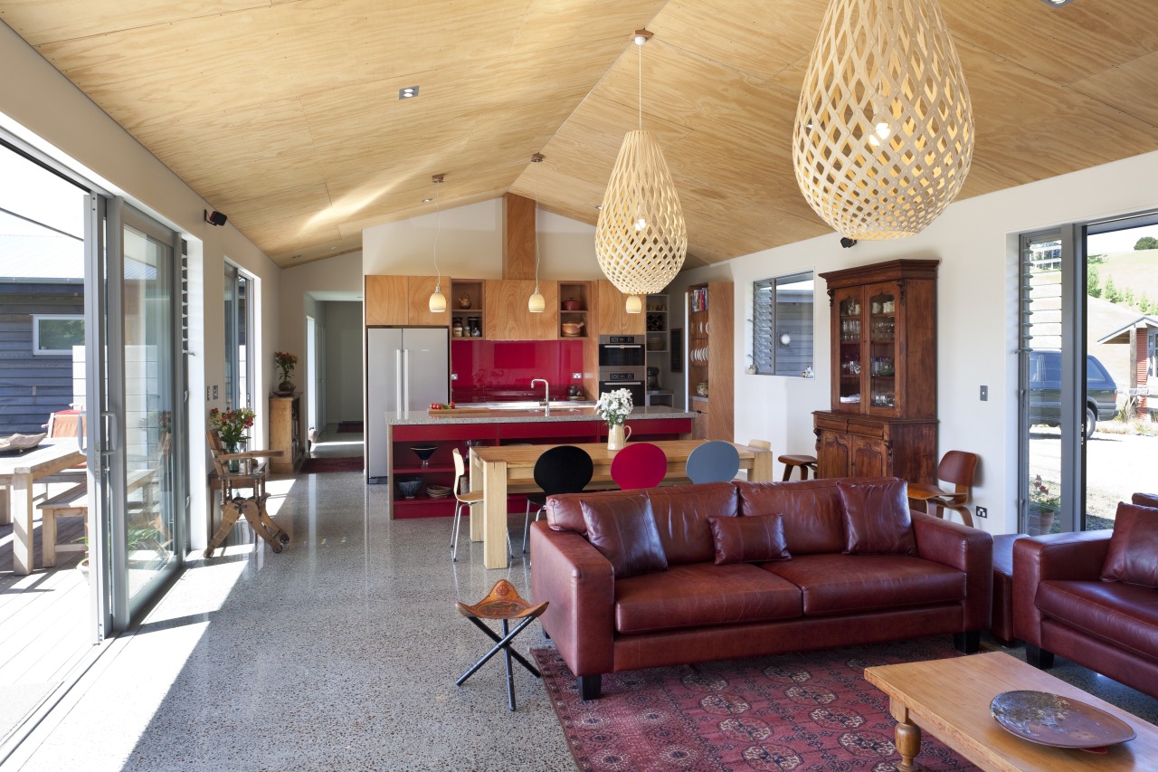 Lounge with red leather couch and hanging light ceiling, estate, home, house, interior design, living room, lobby, real estate, room, orange