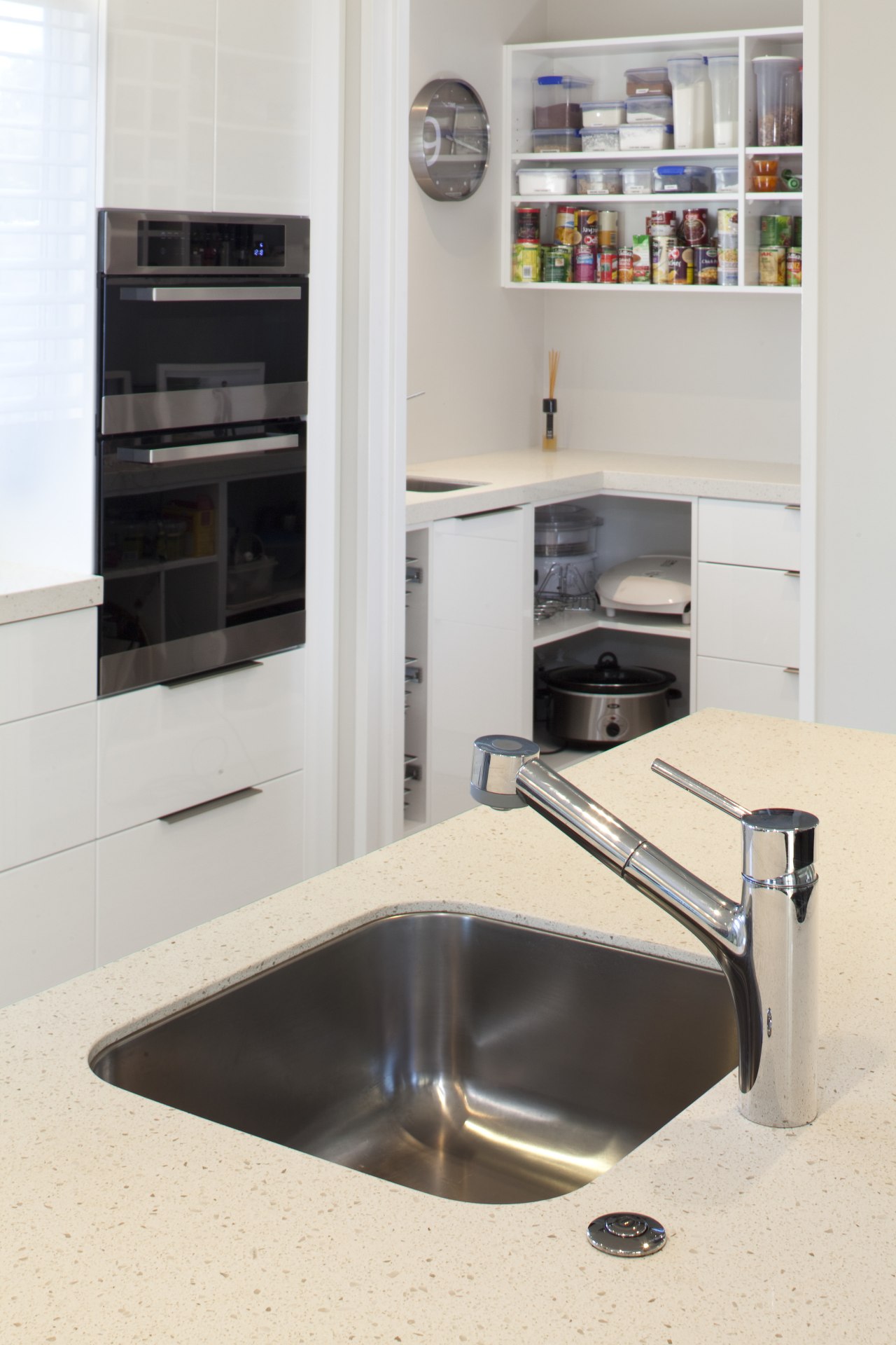 White kitchen with tap and sink in white countertop, home appliance, kitchen, product design, sink, tap, white